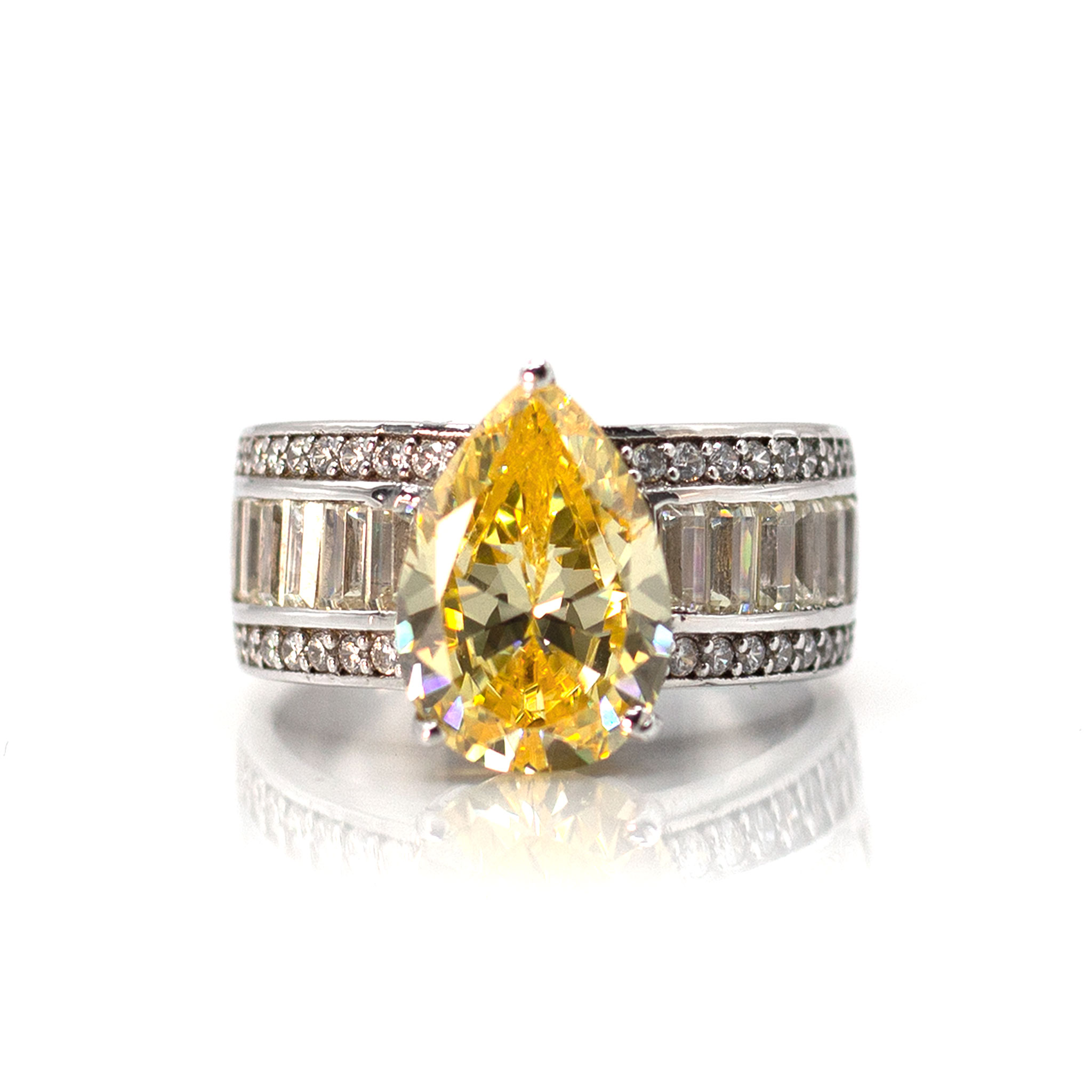 Pearshaped Solitaire & Baguette Zirconia Ring
