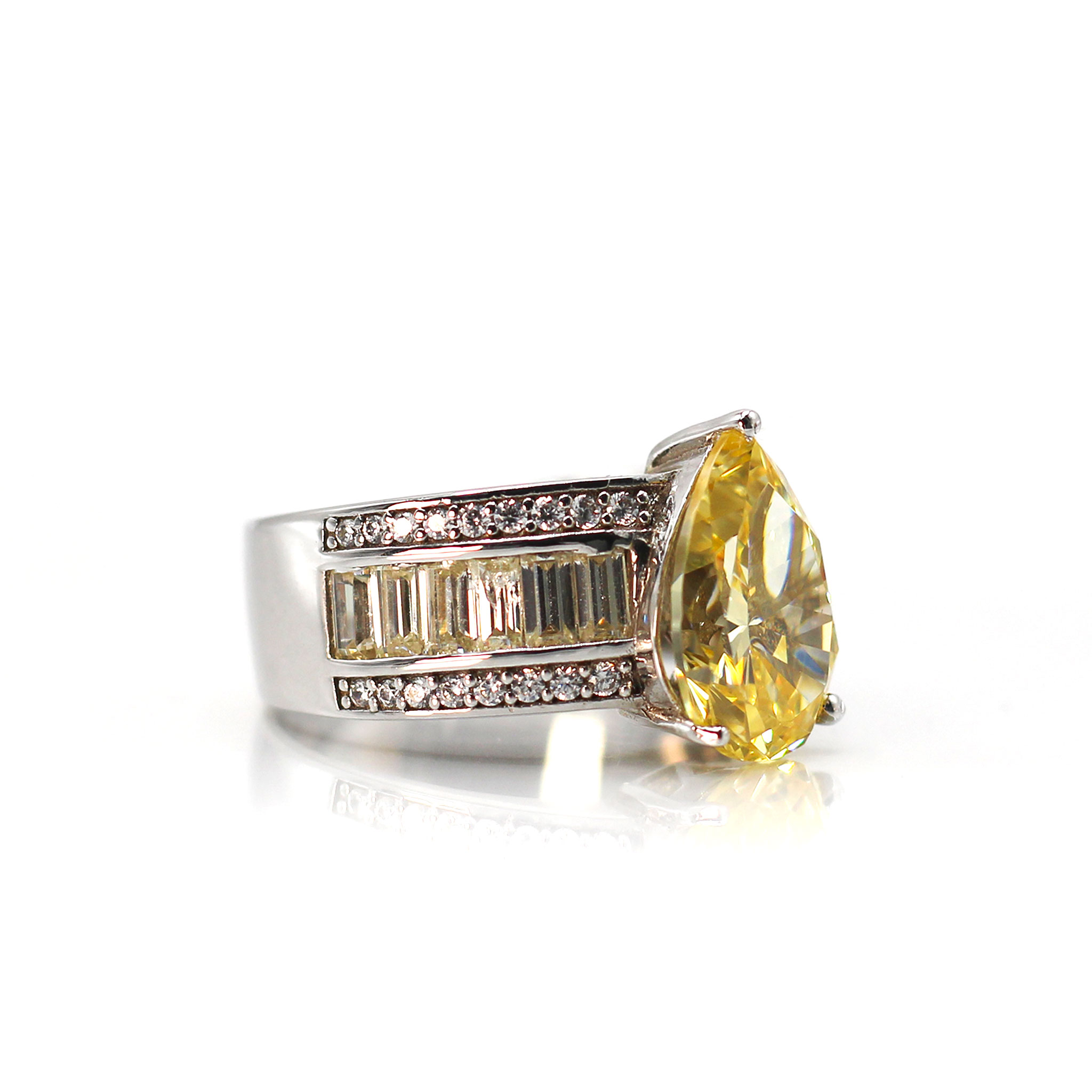 Pearshaped Solitaire & Baguette Zirconia Ring