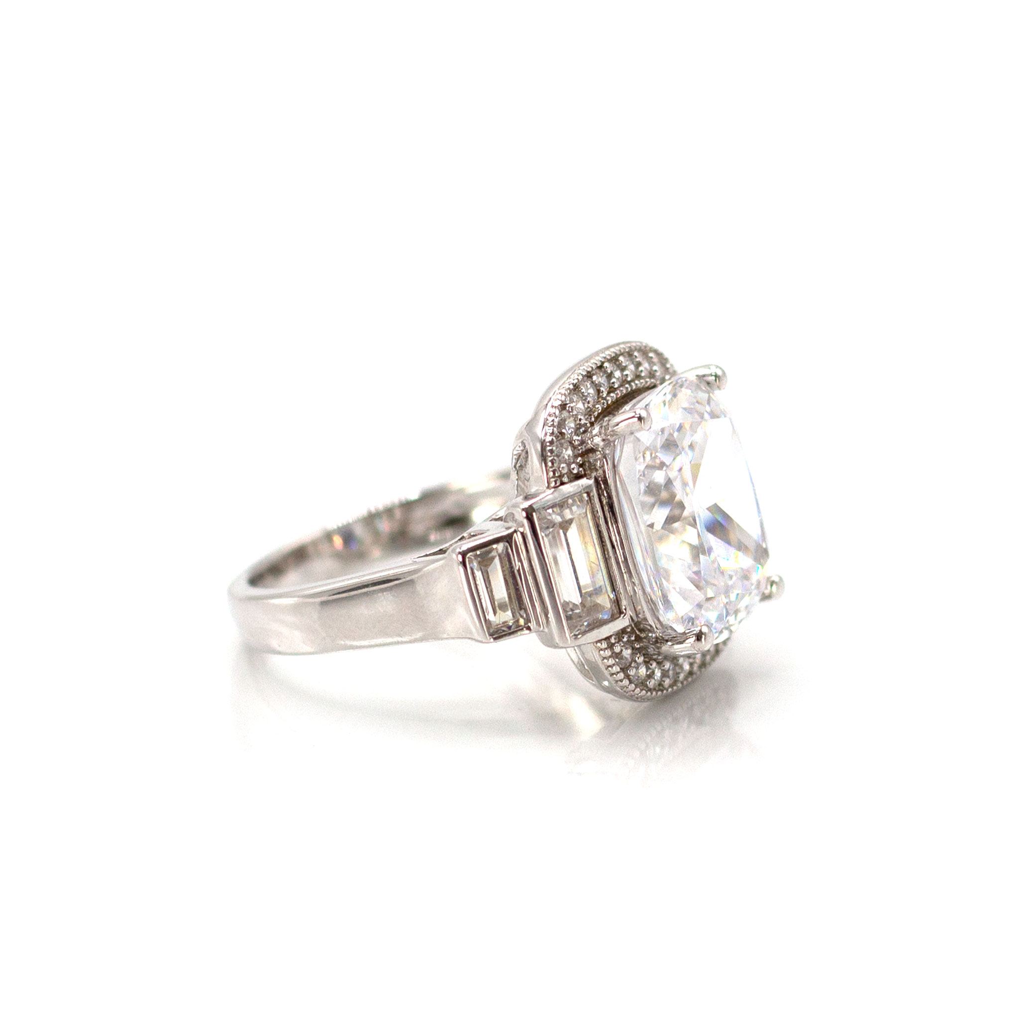 Solitaire & Baguette Zirconia Encircled Ring