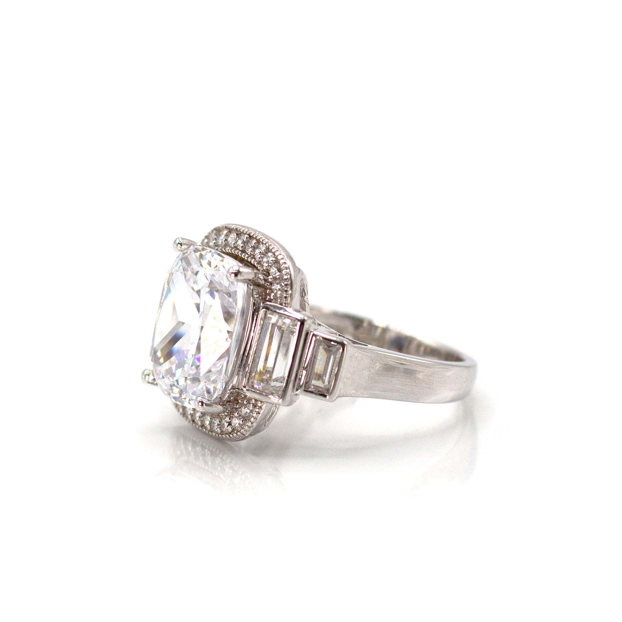 Solitaire & Baguette Zirconia Encircled Ring